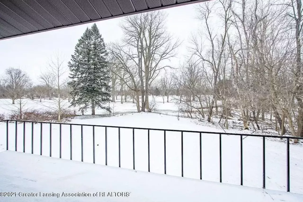 Image: This $339k mid-century modern home near Lansing comes with original George Nelson light fixtures