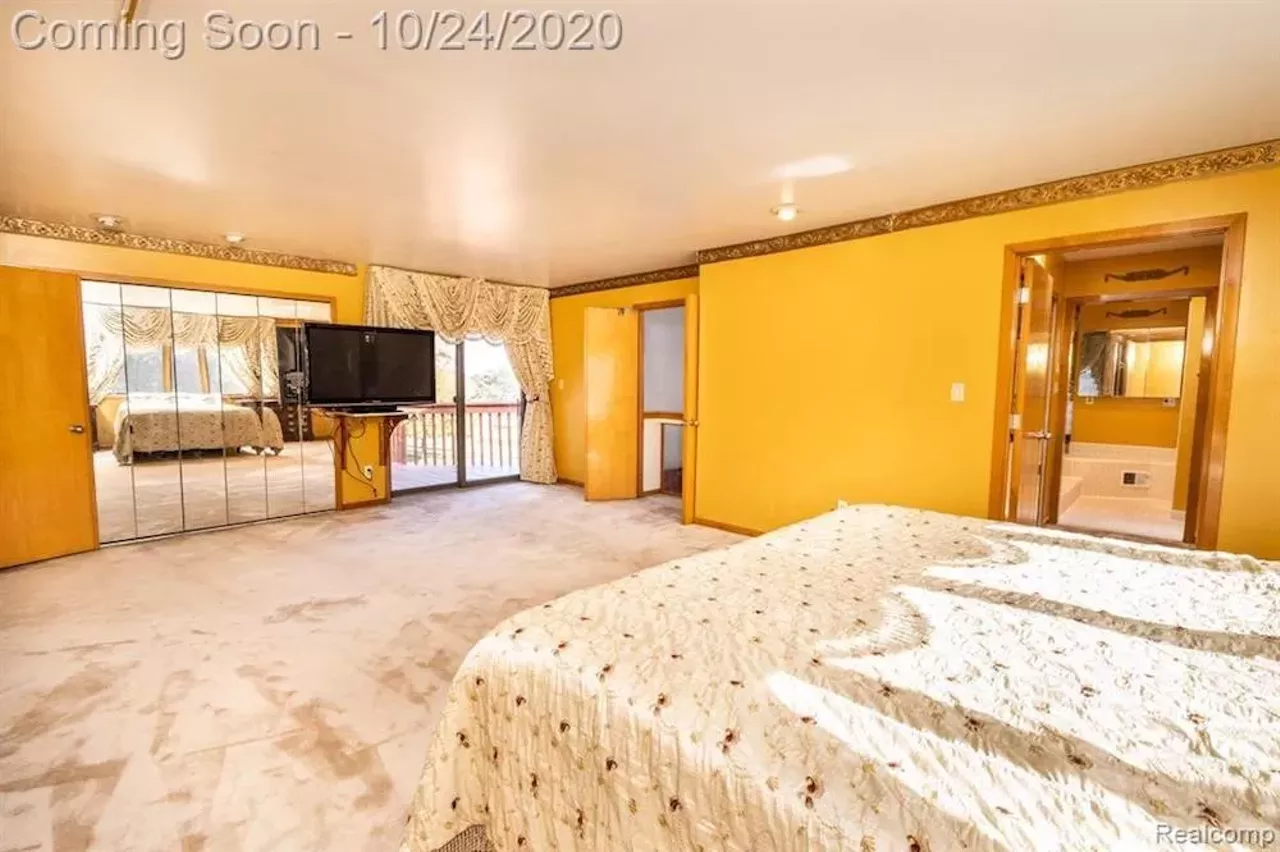 Image: This $550k metro Detroit home designed by the Palace architects has an indoor koi pond