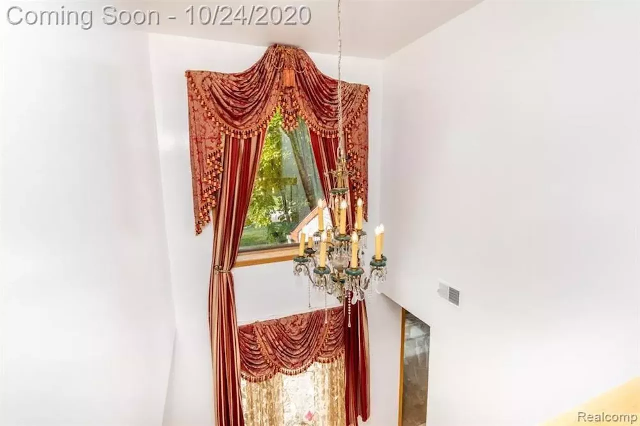 Image: This $550k metro Detroit home designed by the Palace architects has an indoor koi pond