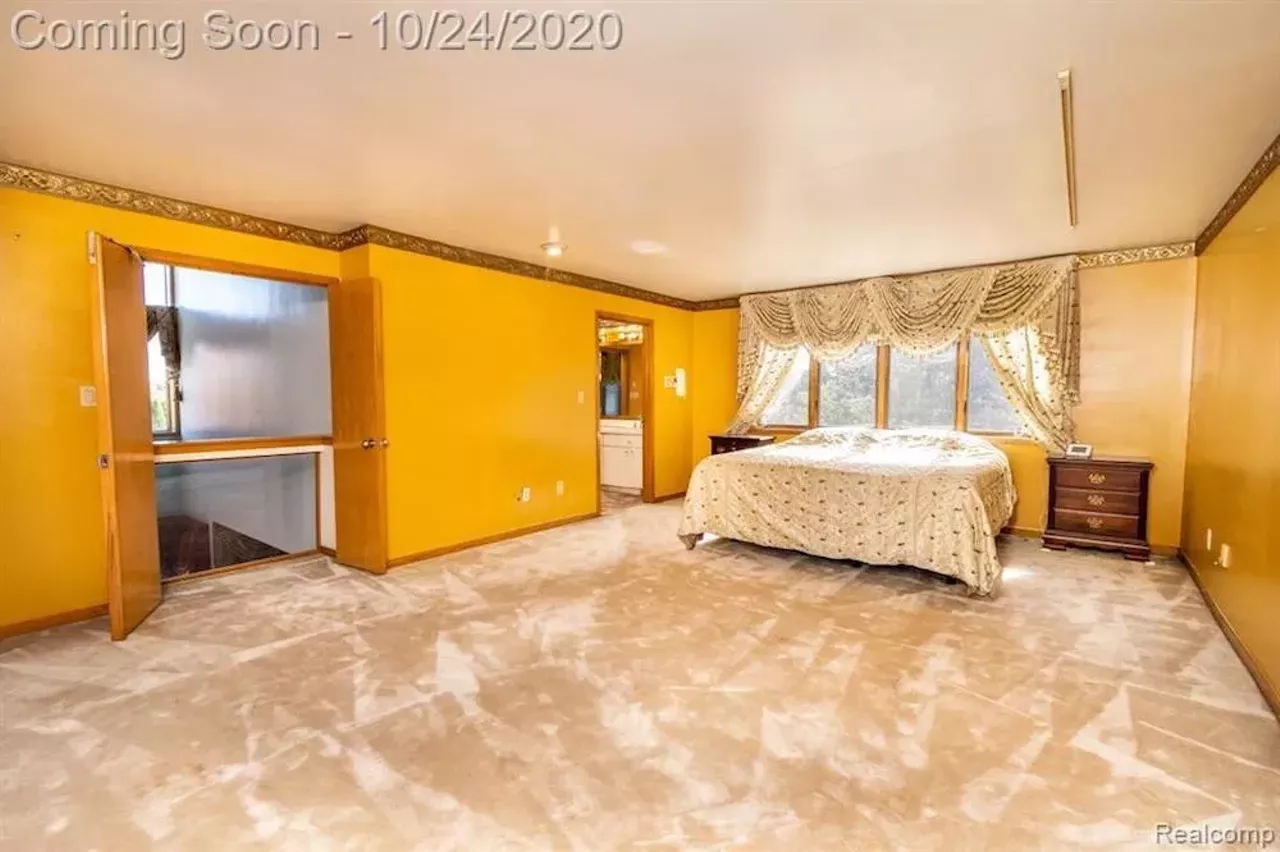 Image: This $550k metro Detroit home designed by the Palace architects has an indoor koi pond