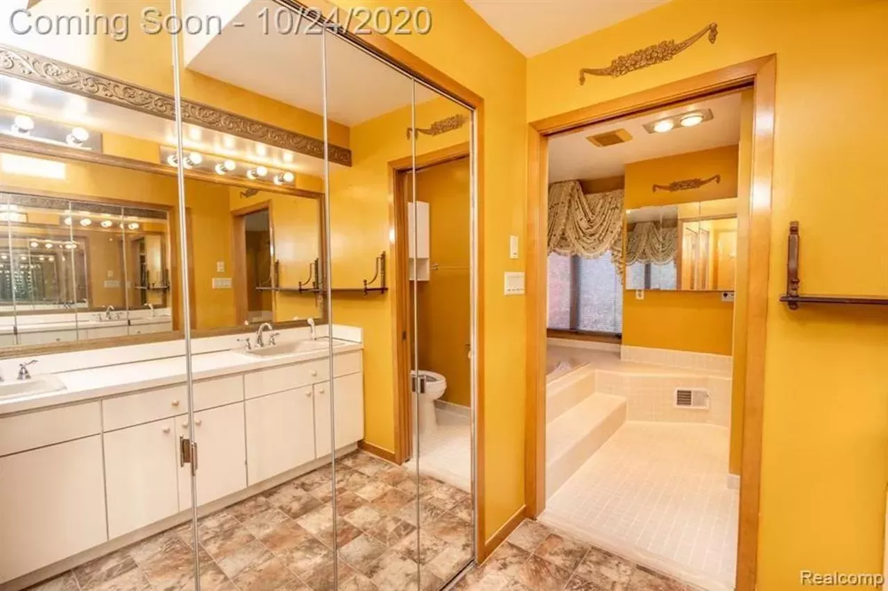 Image: This $550k metro Detroit home designed by the Palace architects has an indoor koi pond
