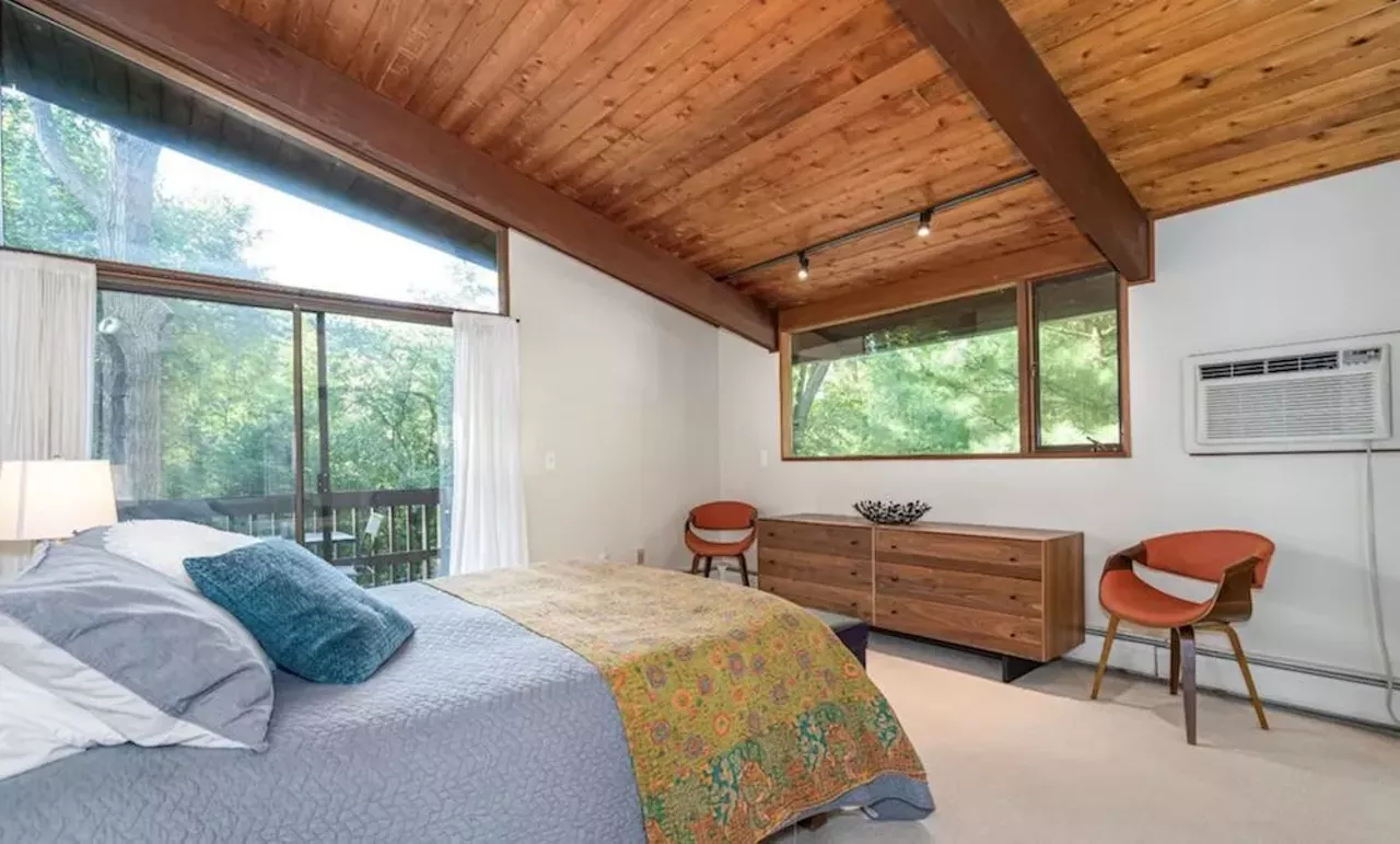 Image: This $585k zen AF Ann Arbor home has a pergola and koi pond