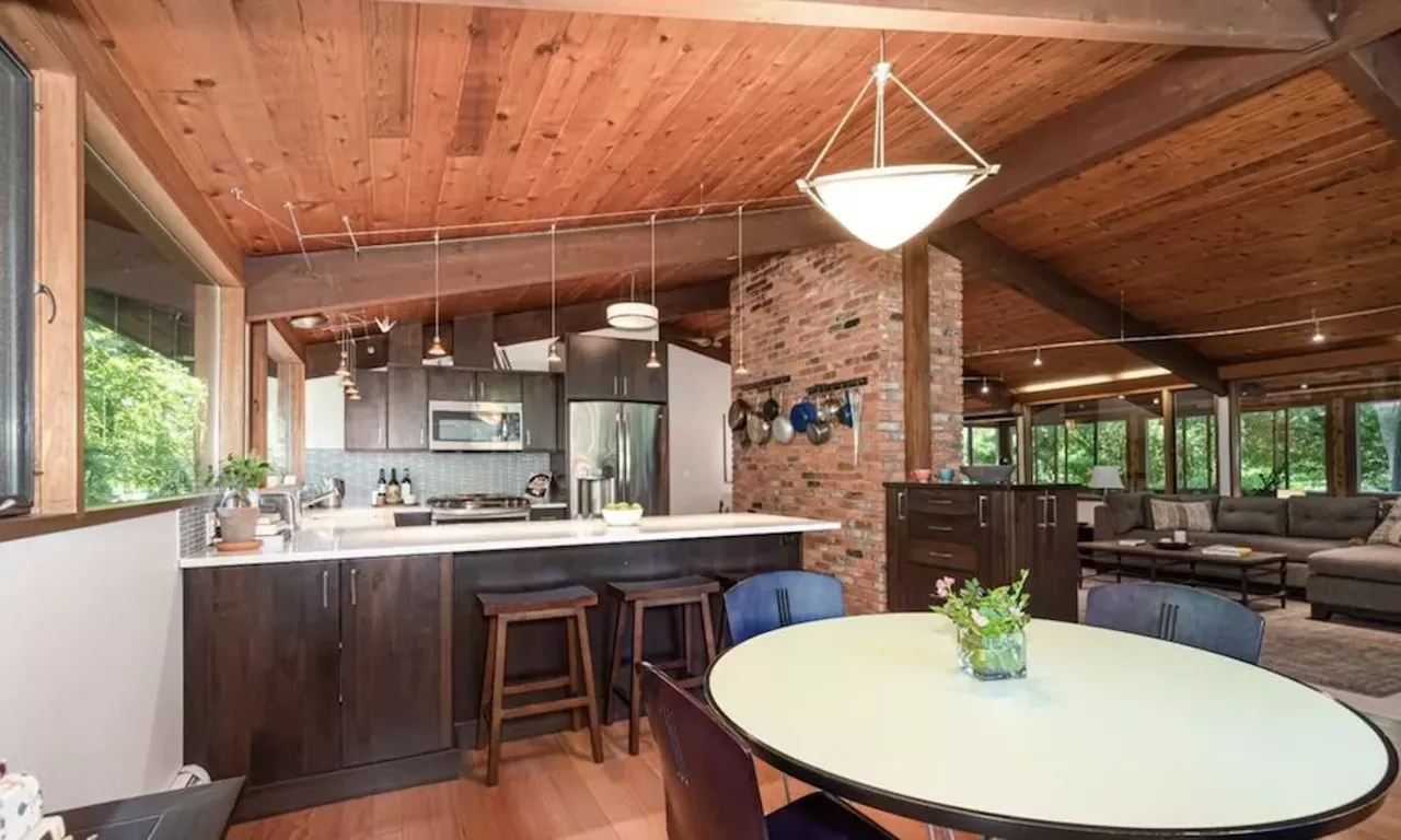 Image: This $585k zen AF Ann Arbor home has a pergola and koi pond