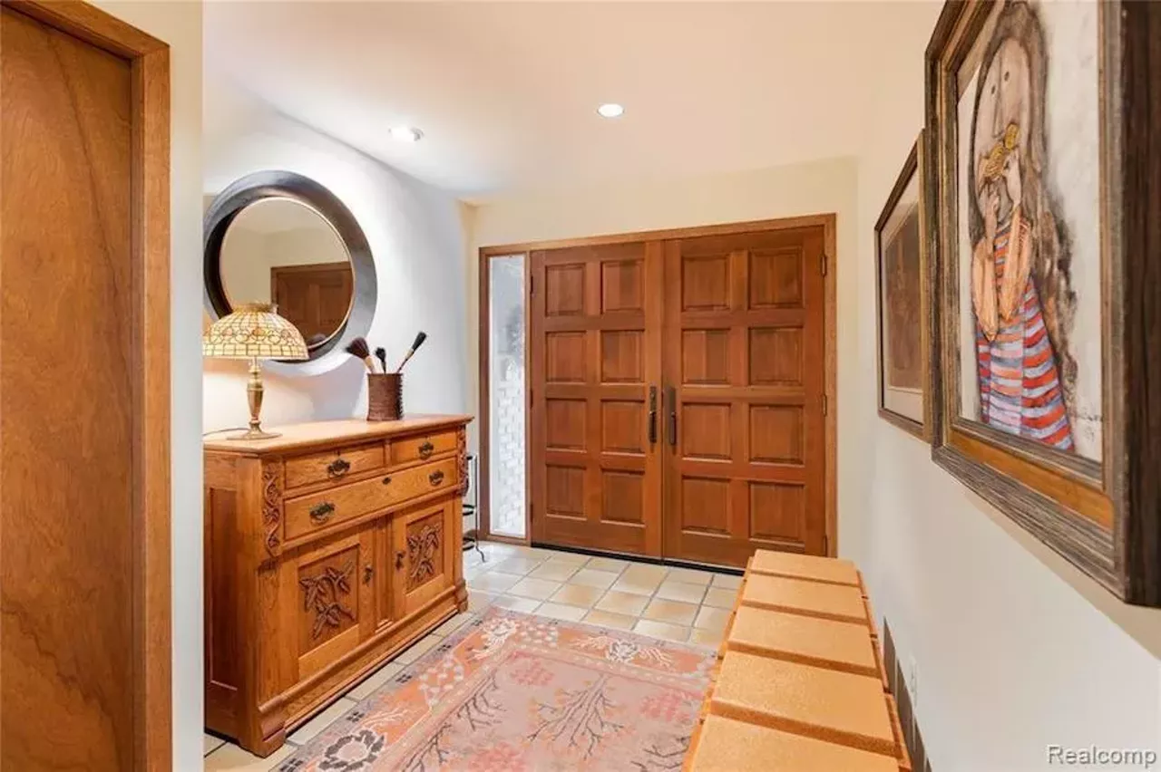 Image: This custom $649k home in Grosse Ile has a fabulous conversation pit