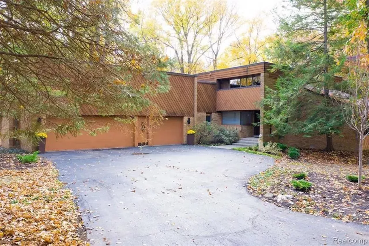Image: This custom $649k home in Grosse Ile has a fabulous conversation pit