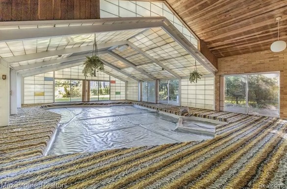 This Detroit area home comes with a carpeted pool