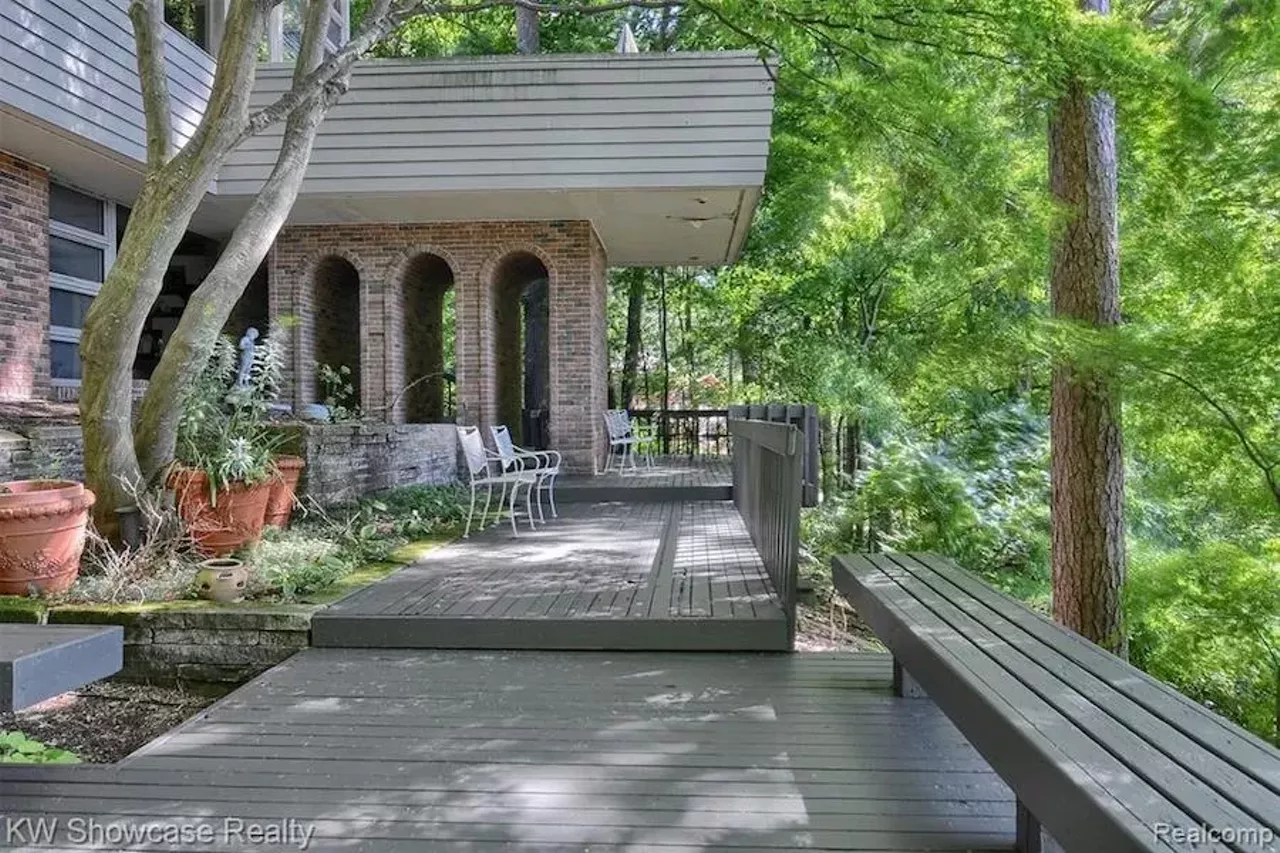 Image: This Frank Lloyd Wright-inspired waterfront home in Michigan has an artist loft, atrium, and waterfall