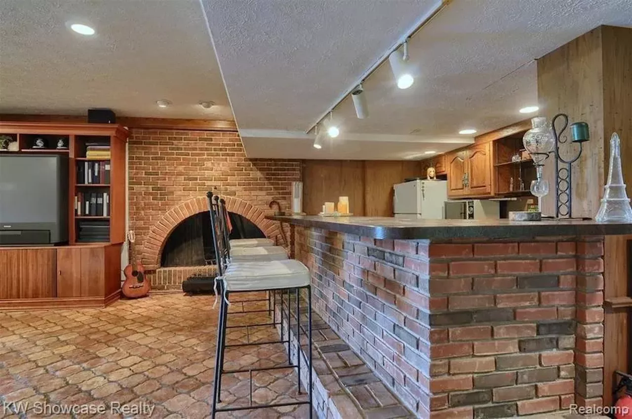 Image: This Frank Lloyd Wright-inspired waterfront home in Michigan has an artist loft, atrium, and waterfall