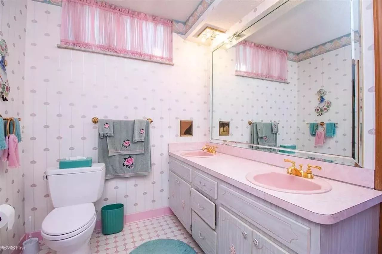 Image: This retro $597k home in Clinton Township has a mirrored indoor koi pond &#151;&nbsp;and we are speechless