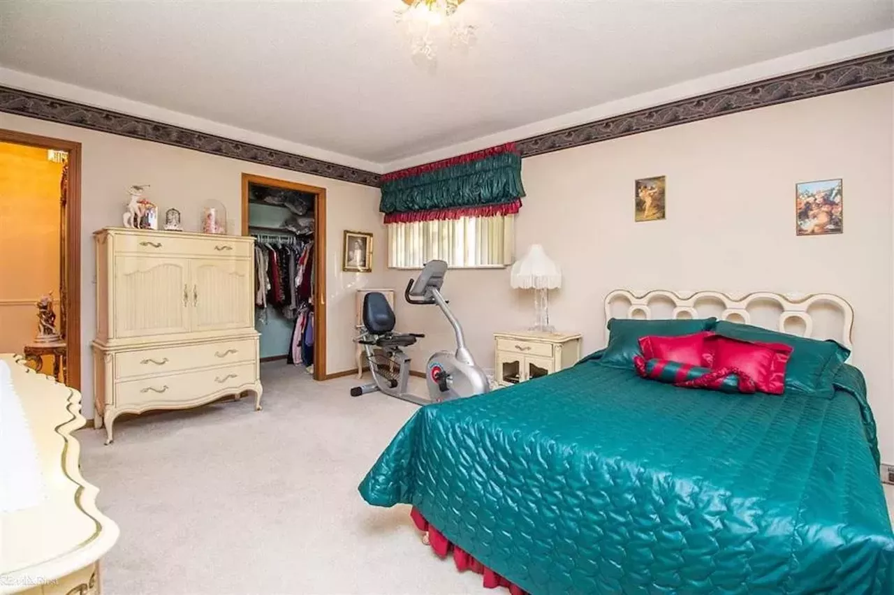 Image: This retro $597k home in Clinton Township has a mirrored indoor koi pond &#151;&nbsp;and we are speechless