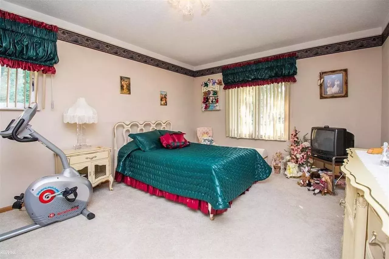 Image: This retro $597k home in Clinton Township has a mirrored indoor koi pond &#151;&nbsp;and we are speechless