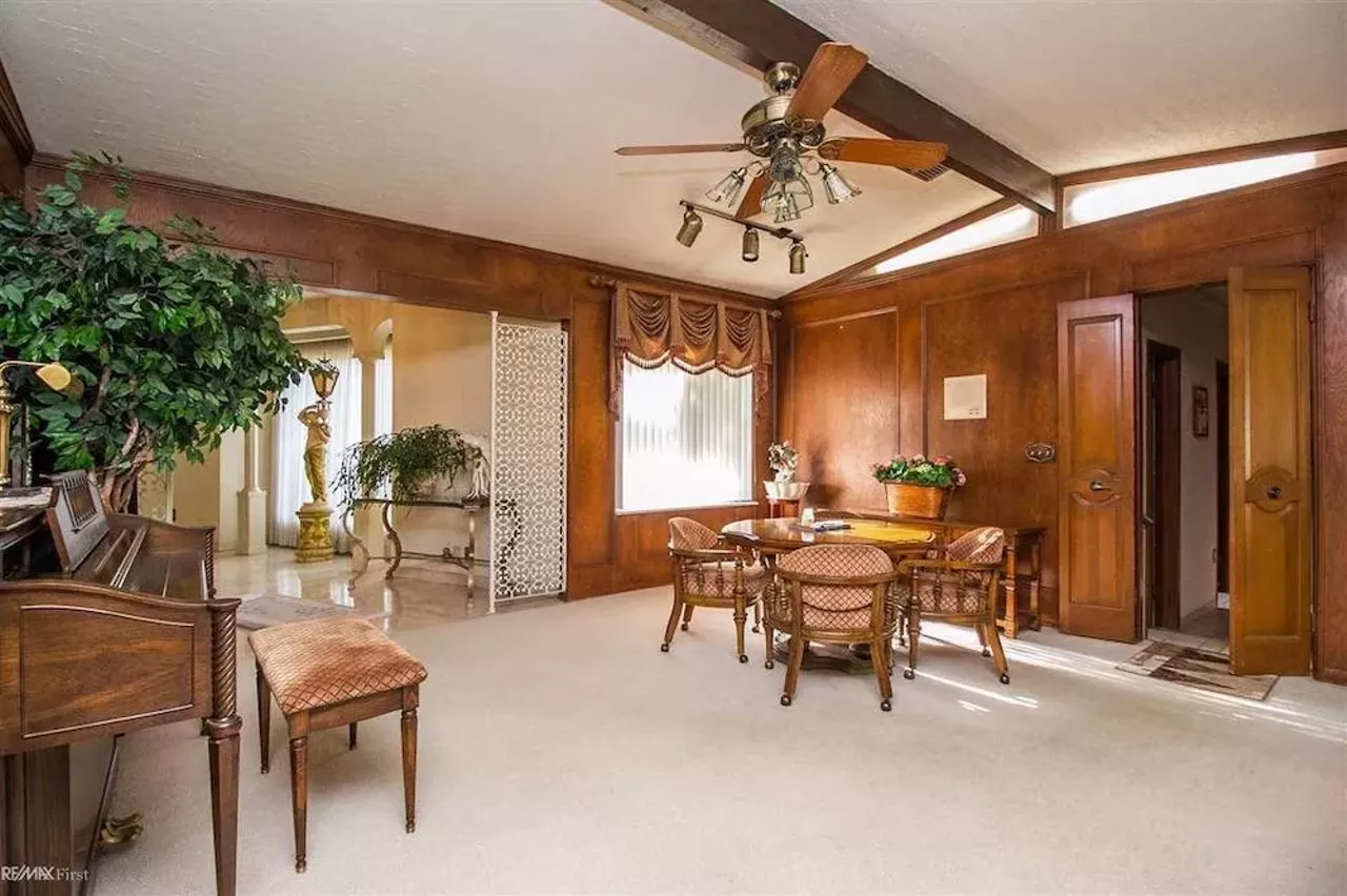 Image: This retro $597k home in Clinton Township has a mirrored indoor koi pond &#151;&nbsp;and we are speechless