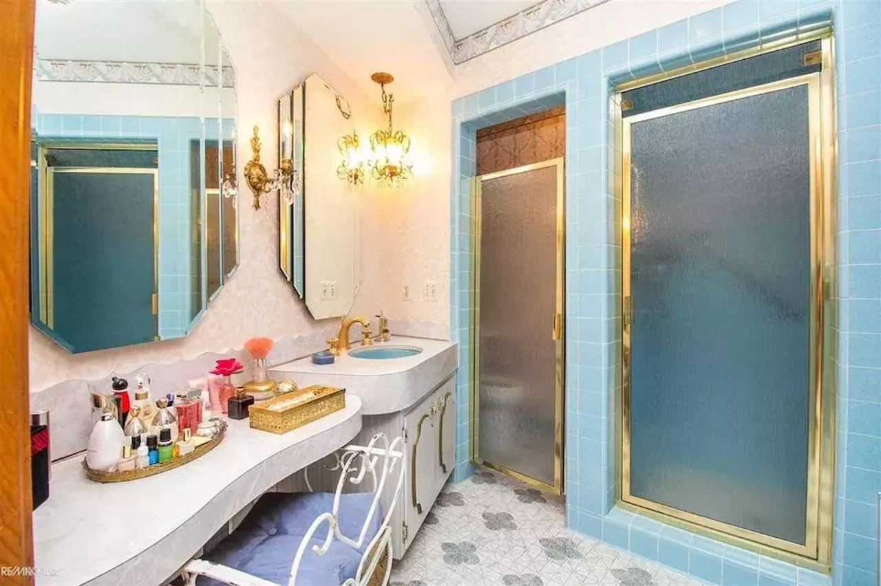 Image: This retro $597k home in Clinton Township has a mirrored indoor koi pond &#151;&nbsp;and we are speechless