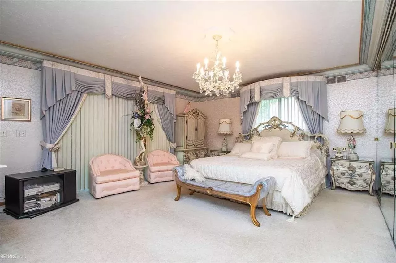 Image: This retro $597k home in Clinton Township has a mirrored indoor koi pond &#151;&nbsp;and we are speechless