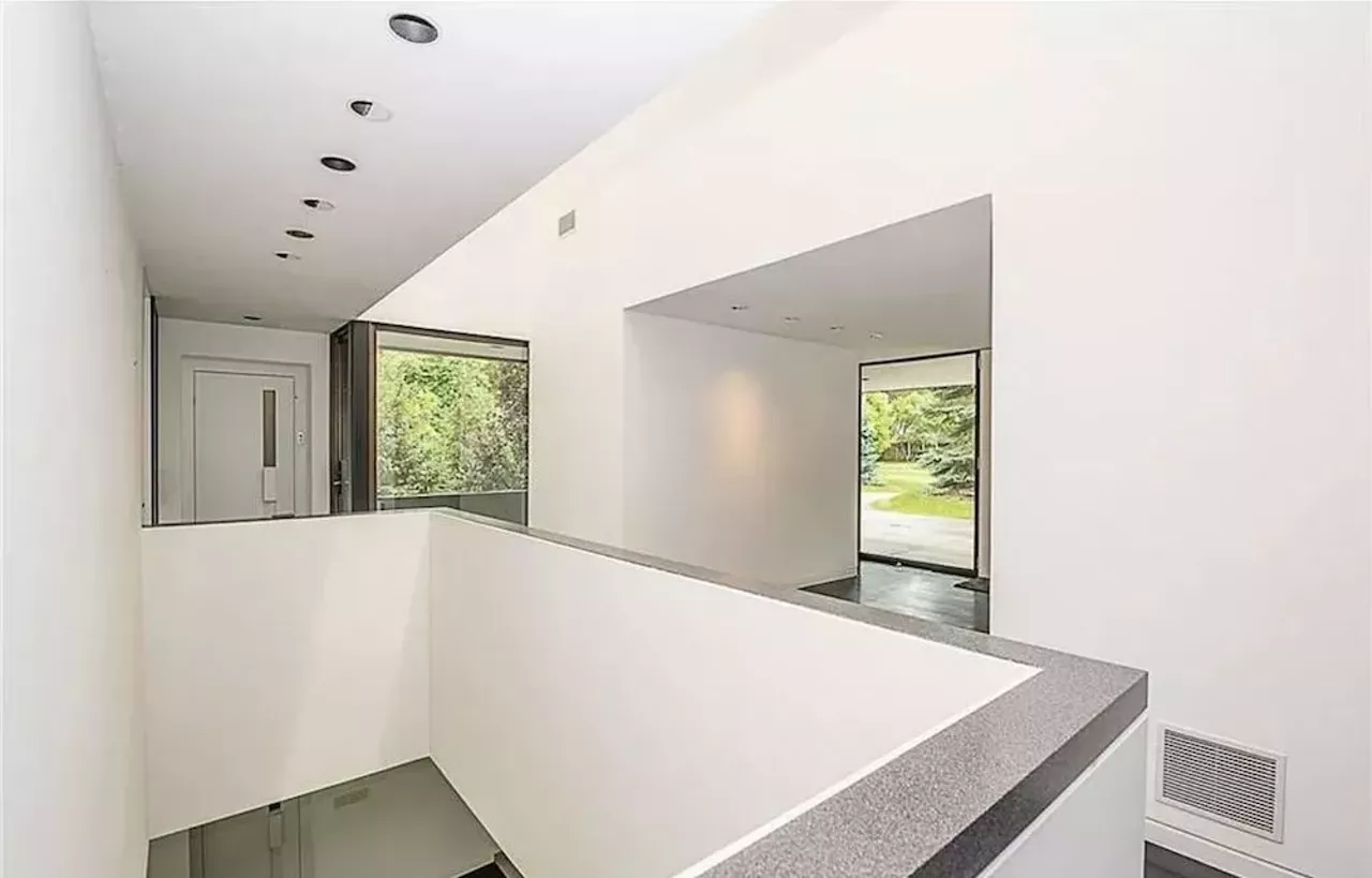 Image: This vertical Franklin Michigan home designed by Sigmund Blum is a modernist's wild dream &#151; and it keeps dropping in price