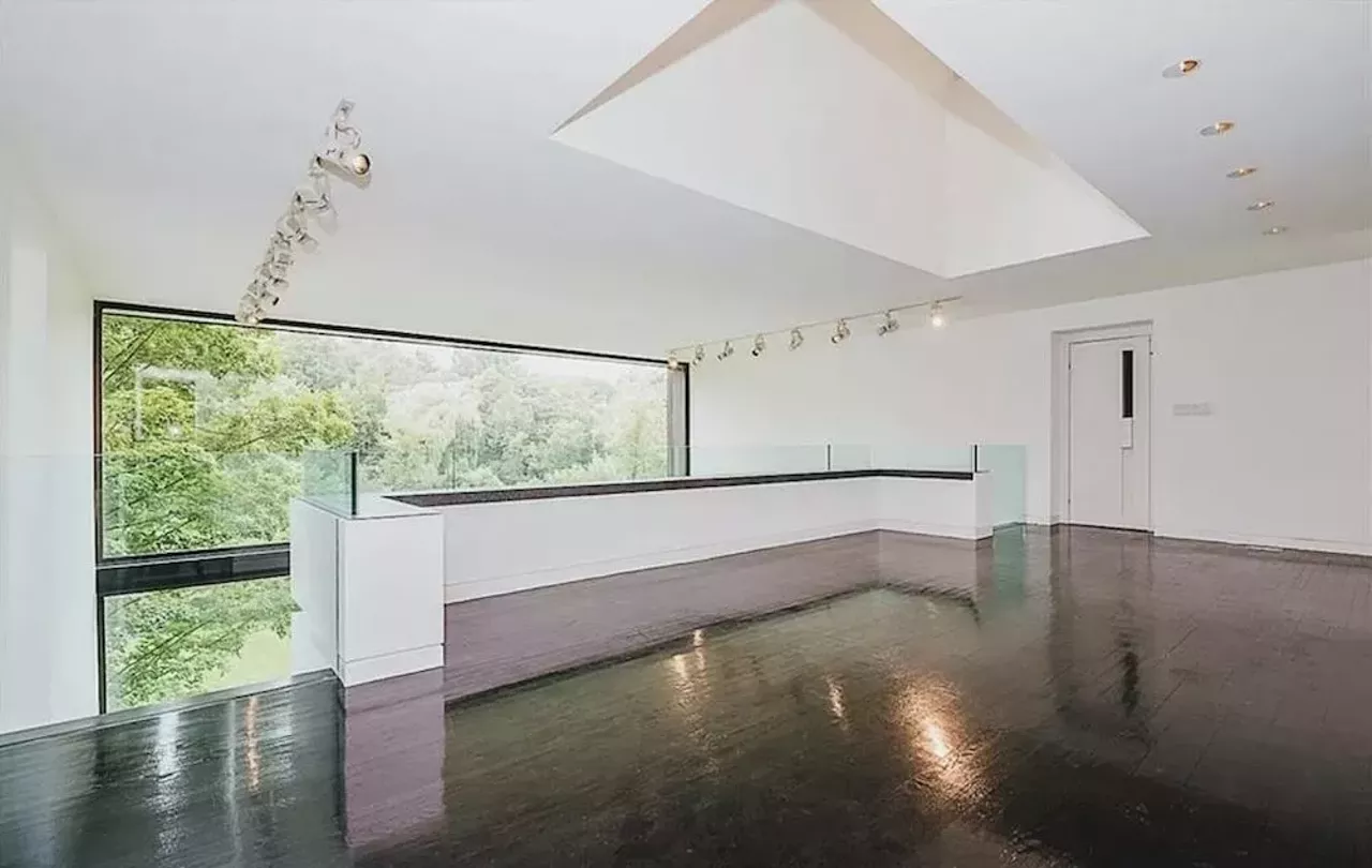 Image: This vertical Franklin Michigan home designed by Sigmund Blum is a modernist's wild dream &#151; and it keeps dropping in price