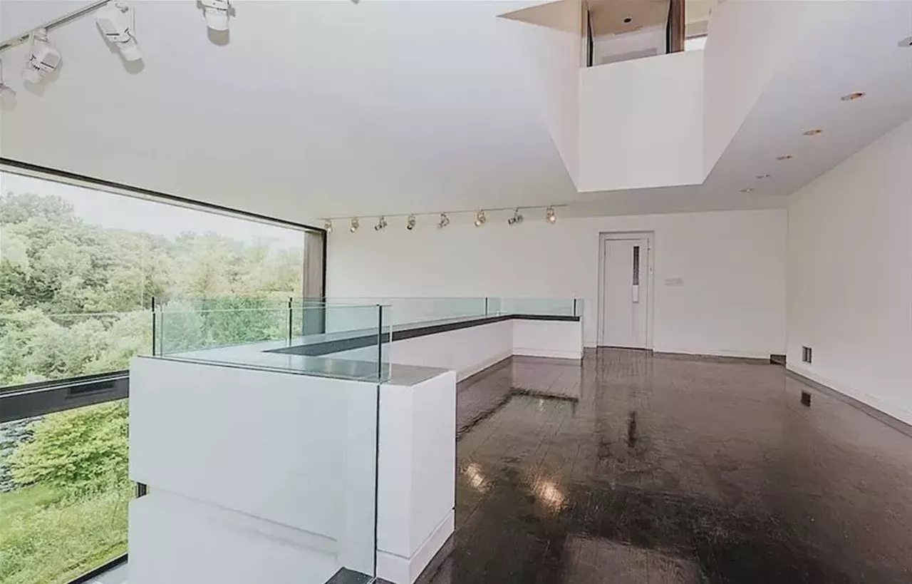 Image: This vertical Franklin Michigan home designed by Sigmund Blum is a modernist's wild dream &#151; and it keeps dropping in price
