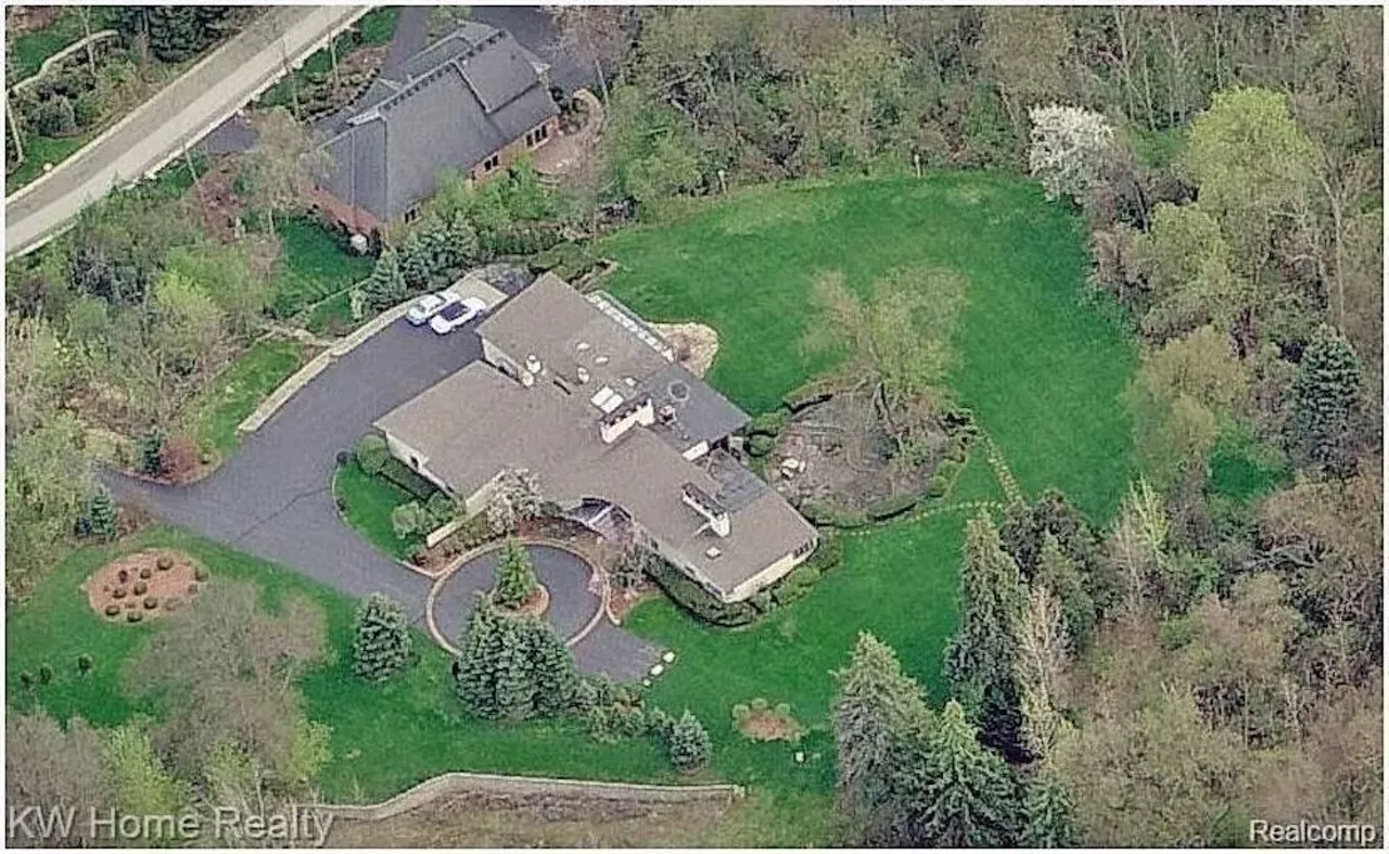 Image: This Wallace Frost-designed home in Bloomfield Hills has Playboy Mansion doors