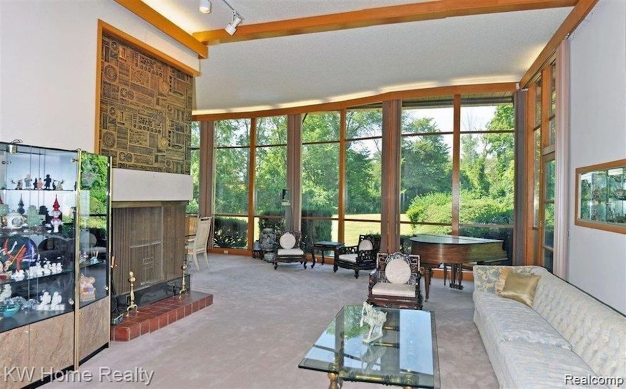 This Wallace Frost-designed home in Bloomfield Hills has Playboy Mansion doors