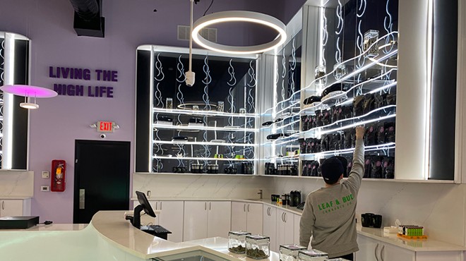 A growing industry: Leaf and Bud’s neon-accented sales floor. The new dispensary claims to be Detroit’s largest.
