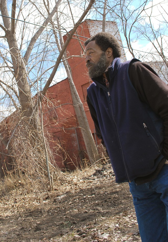 Tom Bell in the yard of his home. - Photo: Detroitblogger John
