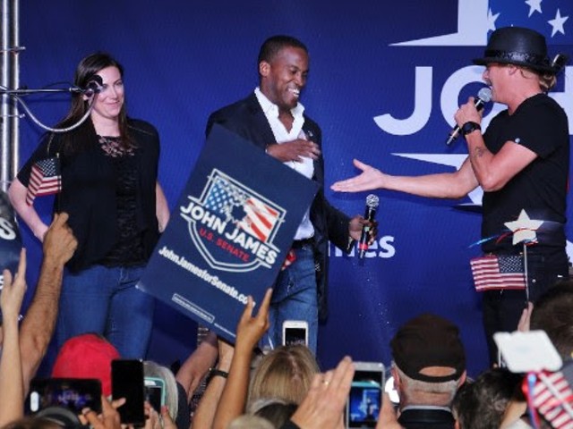 John James, center, who ran for U.S. Senate, was endorsed by Kid Rock,  right, who didn't run for Senate but pretended to.