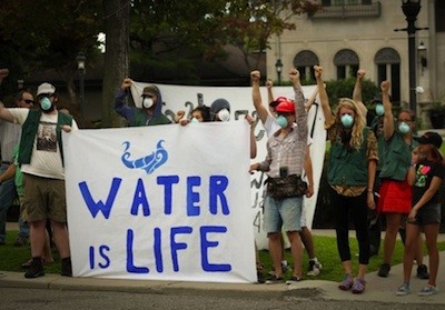 Water rights advocates protest shutoffs in Detroit. - MT FILE PHOTO, VALERIE JEAN