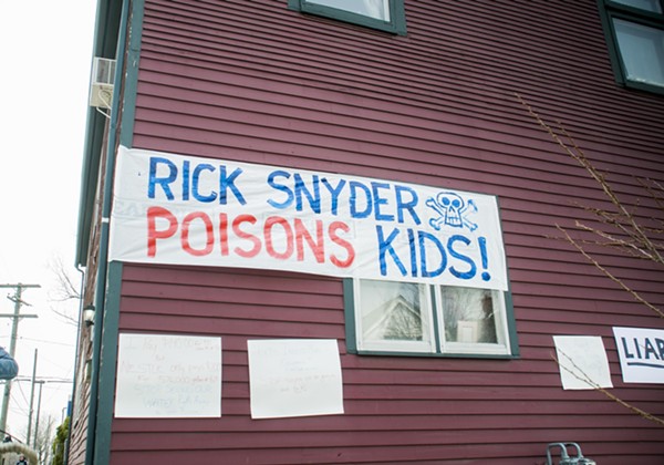 A reminder from some Hamtramck residents: Rick Snyder poisons kids. - Tom Perkins