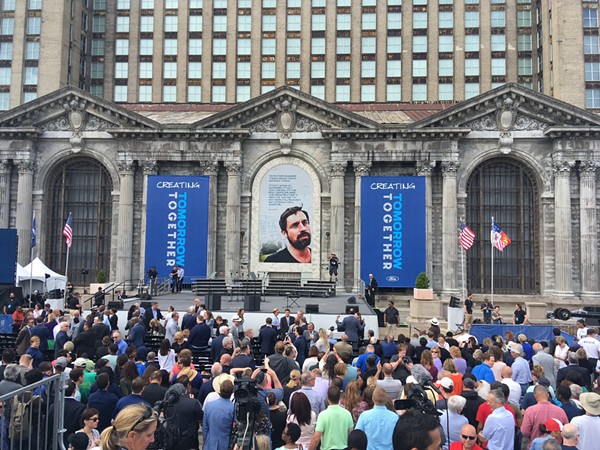 Ford Motor Co. celebrates its purchase of Detroit’s long-abandoned Michigan Central Station. Yes, that is a photo of Phil Cooley. - Lee DeVito
