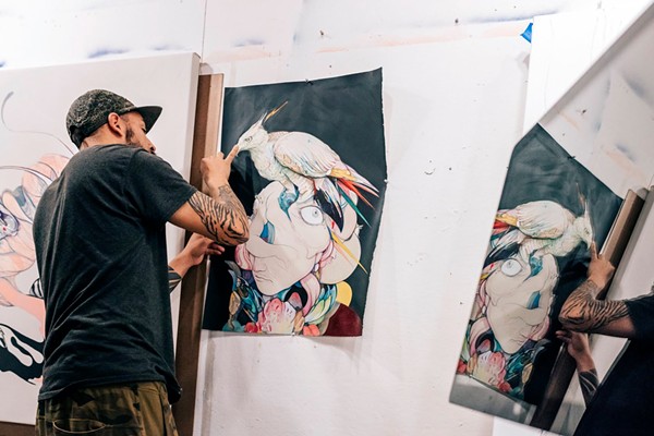 Artist Jose Mertz at work. - Photo via Red Bull Arts Detroit Facebook