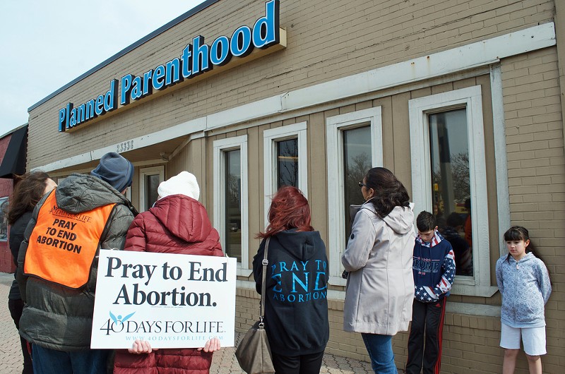 Pro-life protesters surround Ferndale's Planned Parenthood. - Shutterstock