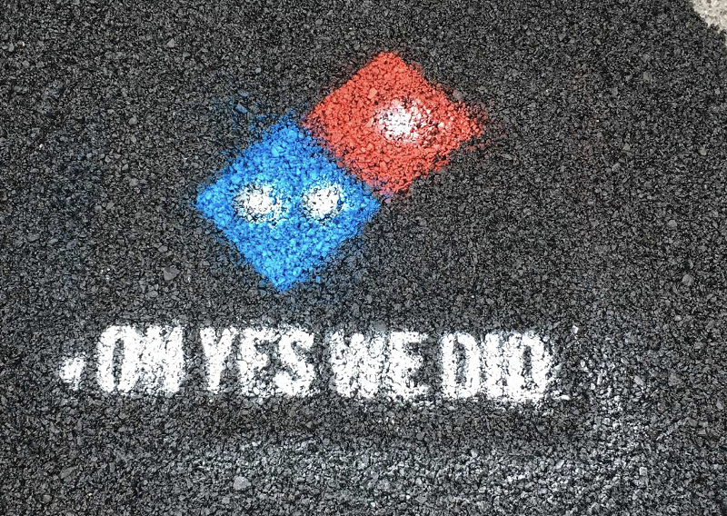 What's grosser than Domino's Pizza? Domino's Pizza paving Hamtramck's roads
