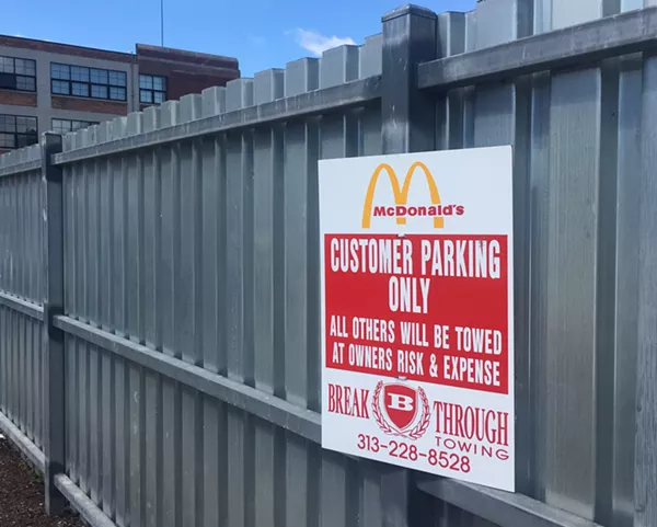 Signage indicates no time limit for McDonald's customers who use the lot. - Violet Ikonomova