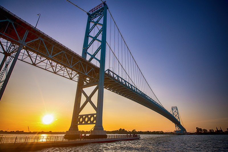 Commuters crossing the Ambassador Bridge will pay less starting today