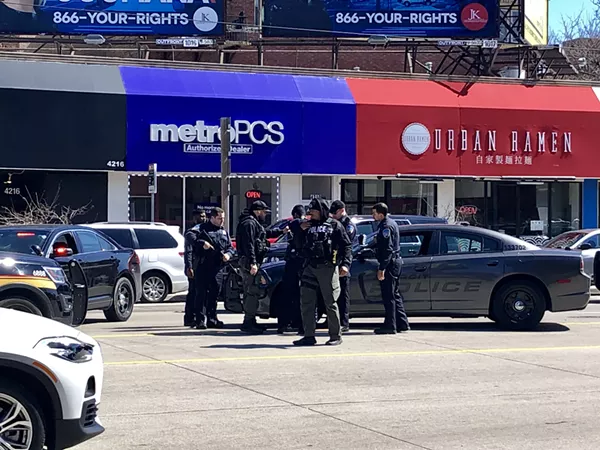 Police arrest the shooting suspect on Woodward near Canfield in Midtown. - Steve Neavling