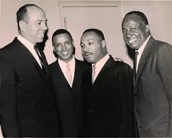 From Left: Mich. Supreme Court Justice Otis M. Smith, Damon J. Keith, Dr. Martin Luther King Jr. and Michigan Secretary of State Richard Austin, 1965. (WSU Press)