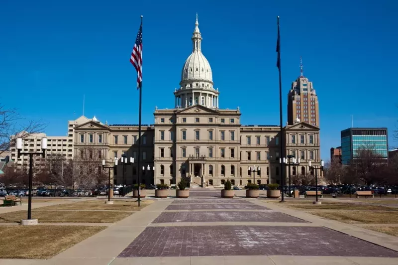 Michigan state legislators have been unwilling to make the tough choice to raise taxes to boost much-needed revenues. - Adobe stock