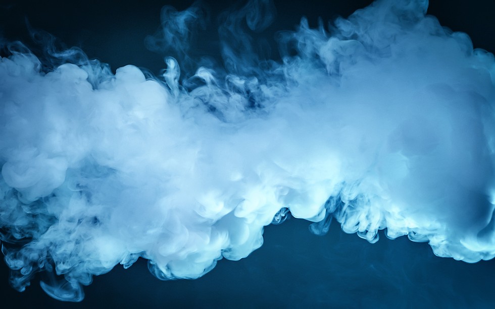 Vaping was introduced to the U.S. mass market in 2007. The "e-liquid," which can come in fruit or candy flavors, is heated up with a battery-powered device, creating thick, white vape clouds when exhaled. - SHUTTERSTOCK