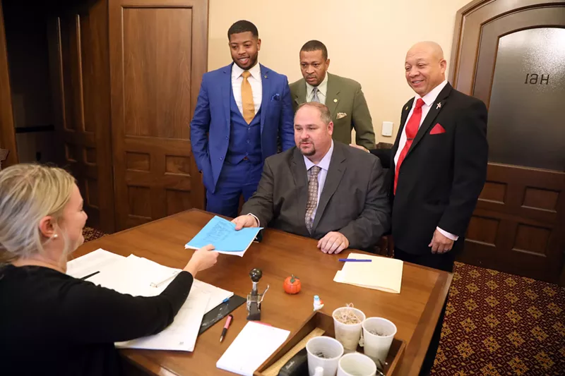 Reps. Isaac Robinson (front), Jewell Jones (left), Tyrone Carter (center), and Sheldon Neeley. - Rep. Isaac Robinson