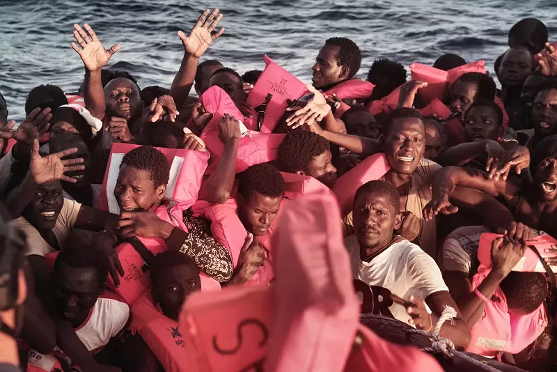 Detroit photographer Kenny Karpov captures the despair and hope of Europe's refugee crisis