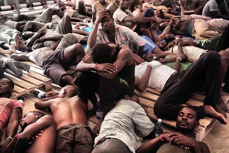 Detroit photographer Kenny Karpov captures the despair and hope of Europe's refugee crisis