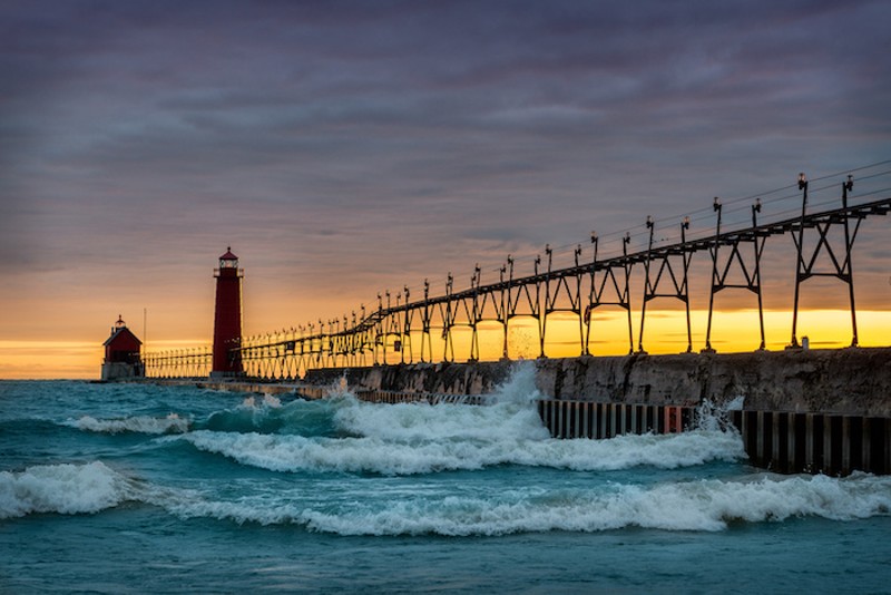 A new report says more intense storms and heavy flooding are putting Michigan residents and businesses at risk. - Adobe Stock