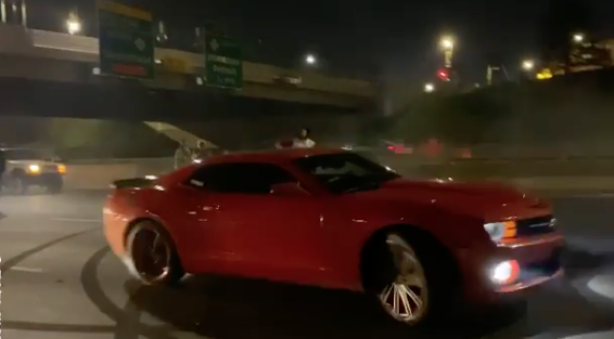 Red Camaro blows donuts on I-94. - Corecity.cc on Instagram