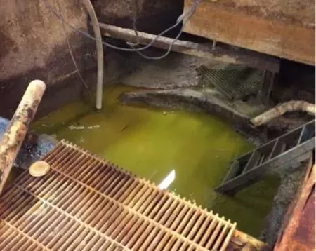 Pit in the basement at the factory responsible for toxic ooze on I-696. - U.S. Environmental Protection Agency