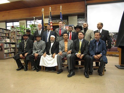 For five minutes, Hamtramck's politicos would take a picture with anybody who joined them.