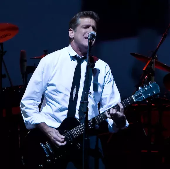 "Glenn Frey" by Steve Alexander - originally posted to Flickr as Glenn Frey. Licensed under CC BY-SA 2.0 via Commons.