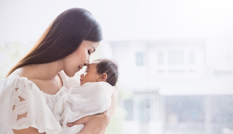 Policy analysts say paid parental-leave policies would benefit new moms and their infants. - paulaphoto / Shutterstock