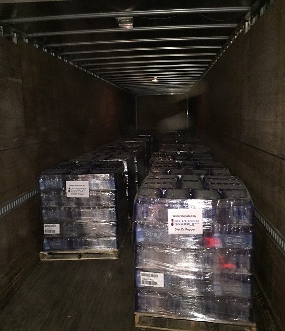 Water pallets delivered to the Food Bank of Eastern Michigan by DPSG on behalf of Diana Hussein.