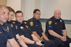 Dearborn city police officers engage in National Day of Prayer Held at the Dearborn Administrative Center - May 7, 2015. - Lion Multimedia Production/Flickr