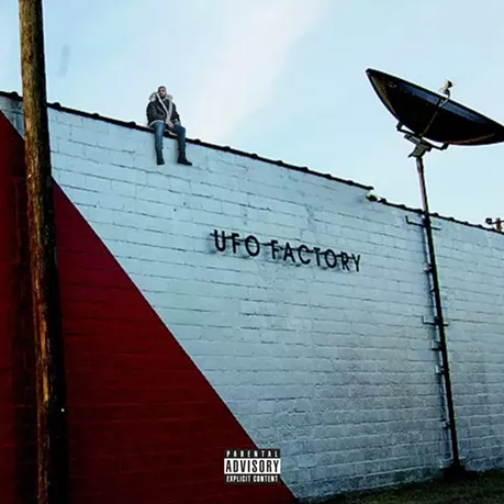 See what Drake looks like sitting on Detroit landmarks